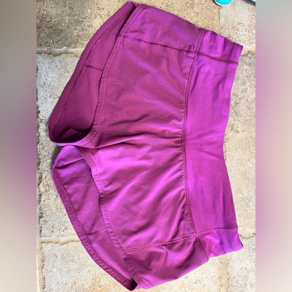 Lululemon speed up low rise shorts. 2.5 inch in seam. Color purple, size 2.